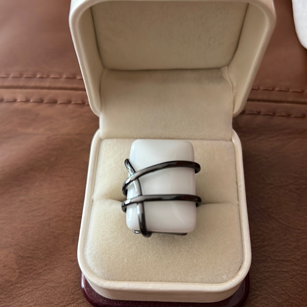White and soft black/silverish color